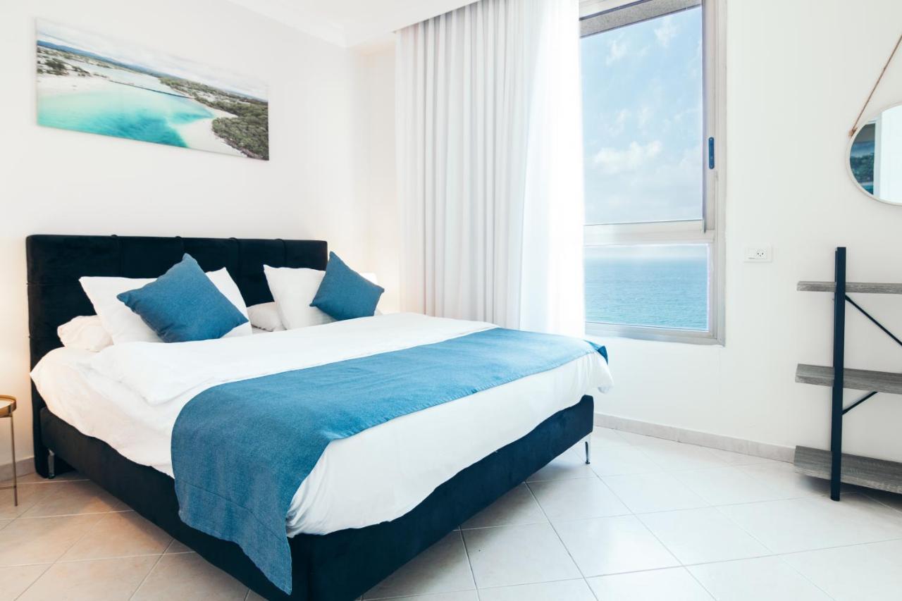 Almog Beach Apartments מגדלי חוף הכרמל חיפה Екстериор снимка